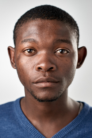 65513601-portrait-of-real-black-african-man-with-no-expression-id-or-passport-photo-full-collection-of